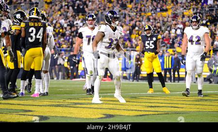 Pittsburgh Steelers vs. Baltimore Ravens. Fans support on NFL Game.  Silhouette of supporters, big screen with two rivals in background Stock  Photo - Alamy