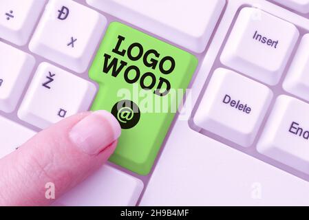 Inspiration showing sign Logo Wood. Conceptual photo Recognizable design or symbol of a company inscribed on wood Abstract Office Typing Jobs Stock Photo