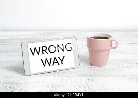Text caption presenting Wrong Way. Business idea taking an unsuitable or undesirable manners or direction Wireless Communications Voice And Video Stock Photo