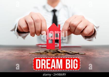 Text sign showing Dream Big. Word for seeking purpose for your life and becoming fulfilled in process New home installments and investments plans Stock Photo