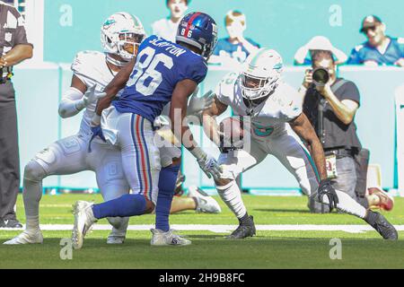 Sunday, December 5, 2021; Miami Gardens, FL USA;  Miami Dolphins cornerback Xavien Howard (25) intercepts the pass intended for New York Giants wide receiver Darius Slayton (86) during an NFL game at Hard Rock Stadium. The Dolphins beat the Giants 20-9. (Kim Hukari/Image of Sport) Stock Photo