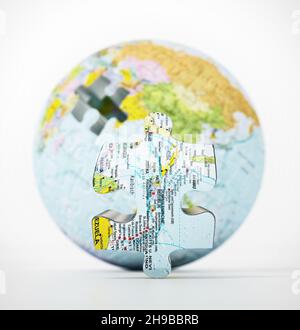 3D globe with world map consisting of puzzle parts isolated on white background. 3D illustration. Stock Photo