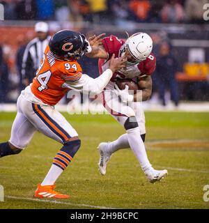 December 05, 2021: Chicago, Illinois, U.S. - Cardinals #14 Andy Lee holds  the ball for kicker #5 Matt Prater during the NFL Game between the Arizona  Cardinals and Chicago Bears at Soldier