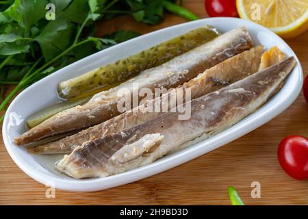 Close-up fillet mackerel on wooden background. Seafood dishes. local name isli uskumru Stock Photo