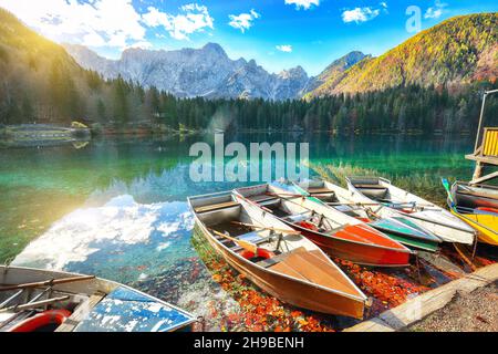 Marvelous view of sunset over Fusine lake with Mangart peak on background. Popular travel destination of Julian Alps. Location: Tarvisio comune , Prov Stock Photo
