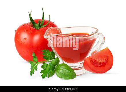 Composition of tomato, ketchup and greens isolated on white background with clipping path. Stock Photo