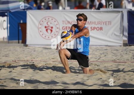 IZMIR, TURKEY - JULY 10, 2021: Russia (Komissarenko and Rukhmanov) vs Norway (Mol, M. and Sunde) Quarterfinal match of CEV U20 Beach Volleyball Europe Stock Photo