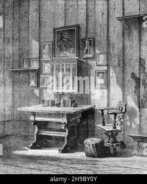 Engraving of Martin Luther's room in Wartburg Castle, showing the ink-stain on the well, where he threw his ink bottle at the devil.. Stock Photo