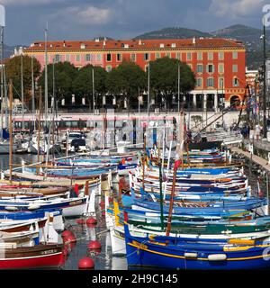small traditional sailing boats in the harbour at  Port Lympia, Nice, Alpes-Maritimes, Provence–Alpes–Côte-d'Azur, France Stock Photo