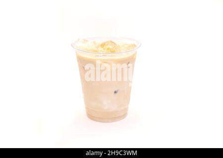 Caramel vanilla iced latte served in a plastic to go cup. Stock Photo