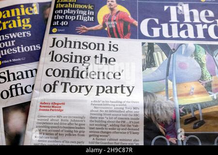 Boris 'Johnson is losing the confidence of Tory party' Guardian newspaper headline 10 Downing Street front page on 23 November 2021 London England UK Stock Photo
