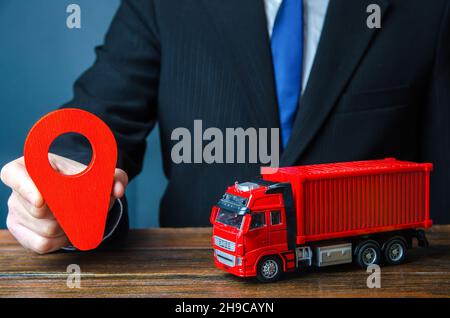 Truck and location pin Stock Photo - Alamy