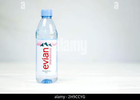 KHARKOV, UKRAINE - JULY 2, 2021: Bottle Of Evian Natural Mineral Water. Evian bottling factory located in Amphion, Haute-Savoie, France Stock Photo