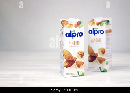 KHARKOV, UKRAINE - JULY 2, 2020: Alpro almond and hazelnut milk packs produced by European company based in Wevelgem, Belgium Stock Photo