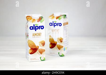 KHARKOV, UKRAINE - JULY 2, 2020: Alpro almond and hazelnut milk packs produced by European company based in Wevelgem, Belgium Stock Photo