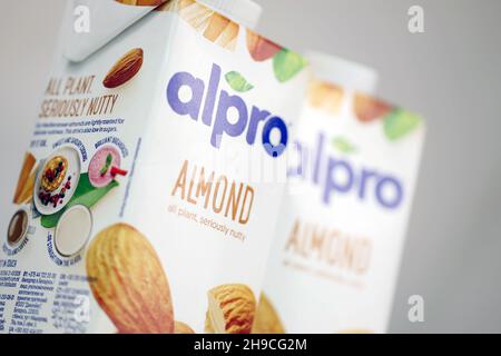 KHARKOV, UKRAINE - JULY 2, 2020: Alpro almond and hazelnut milk packs produced by European company based in Wevelgem, Belgium Stock Photo