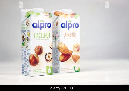 KHARKOV, UKRAINE - JULY 2, 2020: Alpro almond and hazelnut milk packs produced by European company based in Wevelgem, Belgium Stock Photo