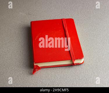 stack of ring binder book or red notebook isolated on white background Stock Photo
