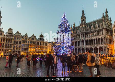 BRUSSELS, BELGIUM - DECEMBER 17, 2018: Evening view of the Grand Place (Grote Markt) with a christmas tree in Brussels, capital of Belgium Stock Photo