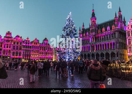 BRUSSELS, BELGIUM - DECEMBER 17, 2018: Evening view of the Grand Place (Grote Markt) with a christmas tree and illuminated buildings in Brussels, capi Stock Photo