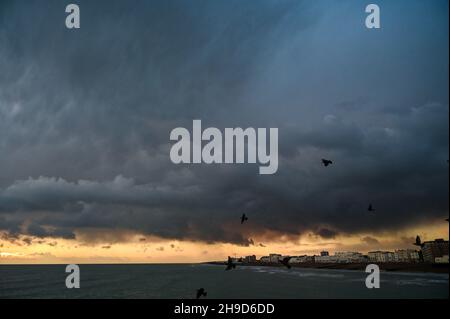 Worthing UK 6th December 2021 -  Dark clouds gather over Worthing along the South Coast as more storms are forecast for the next few days : Credit Simon Dack / Ģ����ý Live News Stock Photo