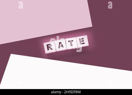 Rate word concept written on wooden cubes blocks lying on a black background. Business services rating concept. Stock Photo