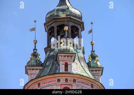 CESKY KRUMLOV, CZECH - APRIL 25, 2012: This is a fragment of the picturesque restored colorful tower of the Krumlov Castle. Stock Photo