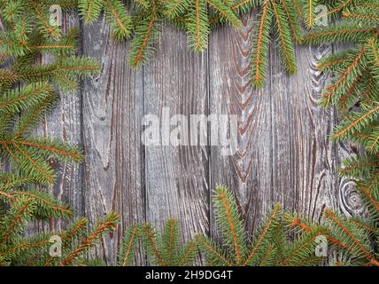 christmas tree fir branches on wood Stock Photo