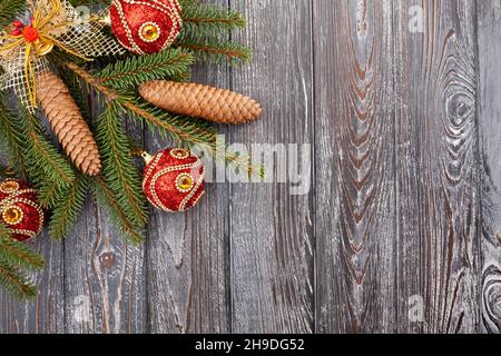 christmas tree fir branches on wood Stock Photo