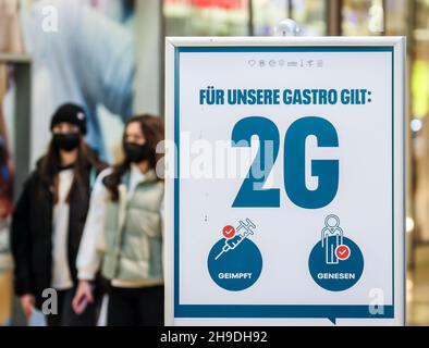 Essen, North Rhine-Westphalia, Germany - 2G Gastronomy in times of corona pandemic. Sign in a shopping mall about the corona protection regulation. Vi Stock Photo
