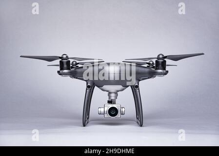 Dark drone on a gray background. Stock Photo