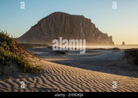 Morro Rock from Morro Strand State Beach, Morro Bay, California, USA Stock Photo