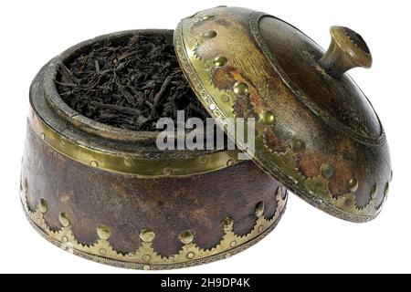 Hipster dad pouring herbal tea from thermos into calabash gourd against boy  with lumber on boardwalk Stock Photo - Alamy