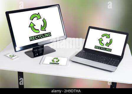 Recycling concept shown on different information technology devices Stock Photo