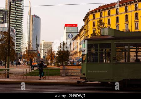 Milan, Italy-November, 16: View of the old vintage green tram on the street of Milan on november 16, 2021 Stock Photo