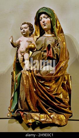 Statue of Virgin Mary enthroned with baby Jesus in her arms, crown on ...