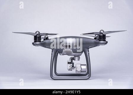 Dark drone on a gray background. Stock Photo