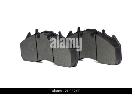 A pair of new brake pads on isolated white background Stock Photo