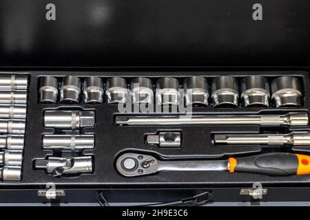 Socket wrench and sockets. Mechanical repairing tool kit box Stock Photo