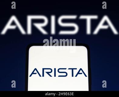 Brazil. 06th Dec, 2021. In this photo illustration the Arista Networks logo seen displayed on a smartphone and on the background. Credit: SOPA Images Limited/Alamy Live News Stock Photo
