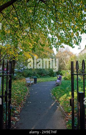 View through entrance gates of Compton Terrace Gardens, London Borough of Islington Stock Photo
