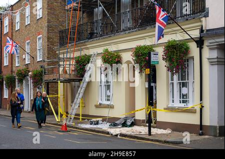 Eton, Windsor, Berkshire, UK. 18th October, 2021. Decorating at an Eton College property in Eton High Street. Painters have remained in high demand throughout the Pandemic. Credit: Maureen McLean/Alamy Stock Photo