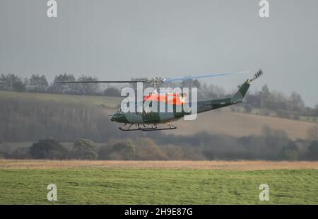 ZH814 British army (Army Air Corps AAC) 1971 helicopter Bell 212 B-BGMH conducting pilot training Salisbury Plain UK Stock Photo