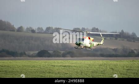 ZH814 British army (Army Air Corps AAC) 1971 helicopter Bell 212 B-BGMH conducting pilot training Salisbury Plain UK Stock Photo