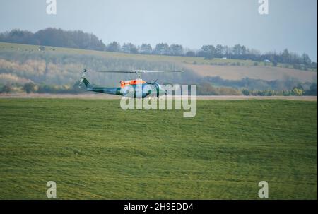 ZH814 British army (Army Air Corps AAC) 1971 helicopter Bell 212 B-BGMH conducting pilot training Salisbury Plain UK Stock Photo