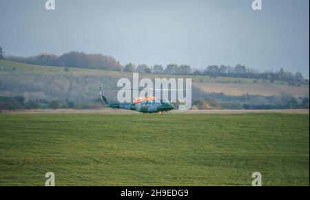 ZH814 British army (Army Air Corps AAC) 1971 helicopter Bell 212 B-BGMH conducting pilot training Salisbury Plain UK Stock Photo