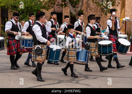 Drummers in a Highland Scottish bagpipe band marching in a parade at a Scottish festival in Utah. Stock Photo
