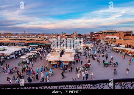 Crowd in Jemaa el Fna square in late afternoon, also Jemaa el-Fnaa, Djema el-Fna or Djemaa el-Fnaa is a square and market place in Marrakech's medina Stock Photo