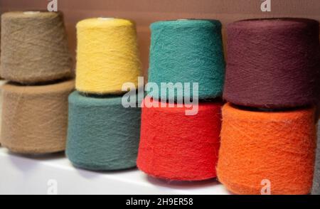 Many multi-colored bobbins of yarn. Knitting. Stock Photo
