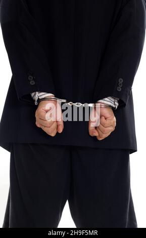 Man in handcuffs, isolated on white Stock Photo